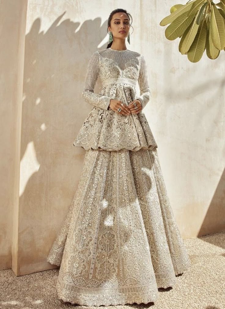 WOMEN'S COLLECTION IN KOTTAKKAL,SOFT NEUTRAL- TONED FESTIVE GOWN.